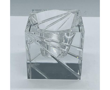 Stylish clear crystal cube, features a symmetrical cut design. Baccarat engraved signature and Baccarat acid backstamp. Issue