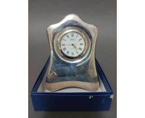 A silver and wood back clock, Sheffield, Carr's of Sheffield Ltd, 1977, with associated box.Condition:- few light scratches t