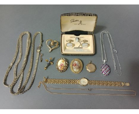 A selection of costume jewellery to include a 9ct gold back and front locket, chains, brooches, a Rotary ladies wristwatch, m