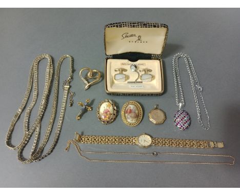 A selection of costume jewellery to include a 9ct gold back and front locket, chains, brooches, a Rotary ladies wristwatch, m