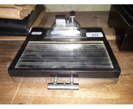 A Ronson Art Deco bakelite and chrome cigarette box/ table lighter.Condition:- General wear through age and use, some pittini