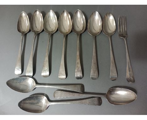 A set of 10 non-matching Georgian silver spoons together with a Georgian fork, London assayed, various makers and dates, gros