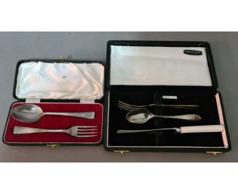 A cased set of hallmarked silver spoon and fork together with a non-matching (not silver) knife, Sheffield, Viner's Ltd (Emil