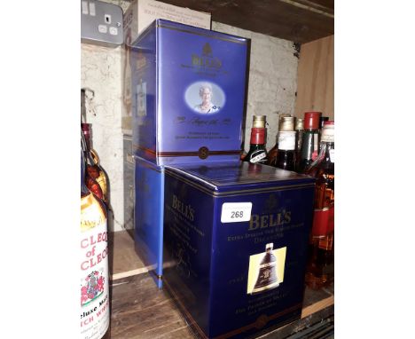 Five boxed commemorative Bell's Extra Special Old Scotch whisky decanters to include Celebrating 100 years Queen Elizabeth Th