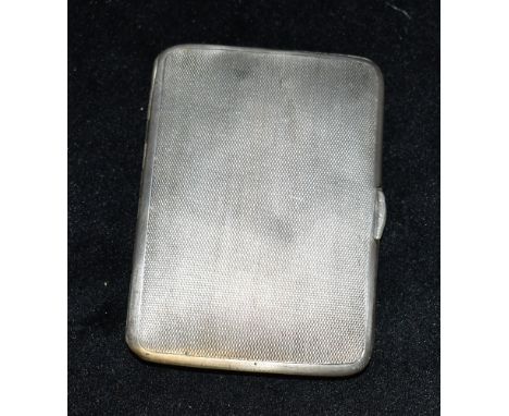 A SILVER CIGARETTE CASE Case of engine turned design, inscribed inside with memorial name and date hallmarked for Chester 191