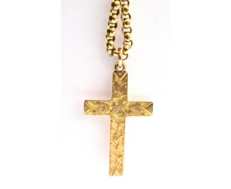 A VINTAGE 9CT GOLD CRUCIFIX AND 9CT GOLD BELCHER CHAIN  The patterned crucifix measuring 2.7cm and the chain measuring 43cm, 