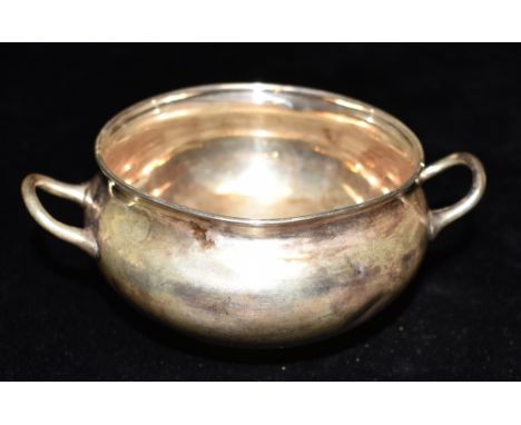 A MAPPIN &amp; WEBB TWIN HANDLED SILVER BOWL OF PLAIN FORM  Hallmarked for London 1910, marked Mappin &amp; Webb, silversmith