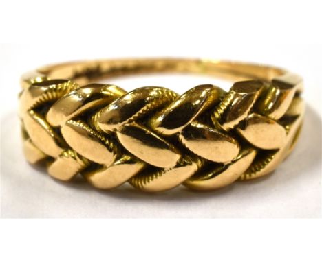 A YELLOW METAL KEEPER RING Faded marks to shank, tests as 9ct, ring size K, weight 4.3g