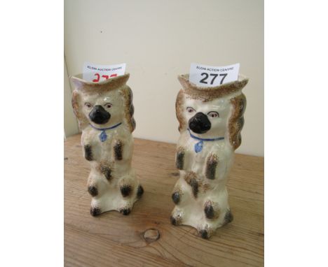  Sale Item:    2 STAFFORDSHIRE DOGS (AF)   Vat Status:   No Vat   Buyers Premium:  This lot is subject to a Buyers Premium of