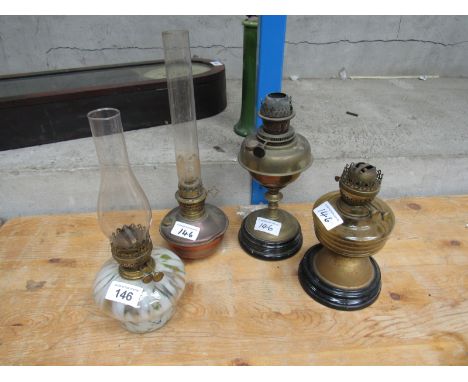 Sale Item:    4 OIL LAMPS   Vat Status:   No Vat   Buyers Premium:  This lot is subject to a Buyers Premium of 15% + Vat @ 2