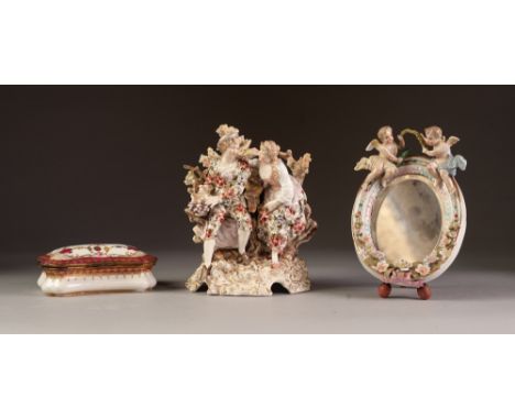 TWENTIETH CENTURY GERMAN PORCELAIN GROUP, painted in colours and gilt and modelled as a maid and her companion, seated in fro