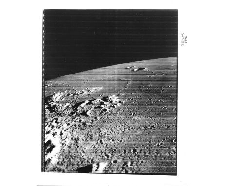 
	
		Twelve NASA press photographs, gelatin silver prints, featuring images of the Moon taken by the Lunar Orbiter III. Image