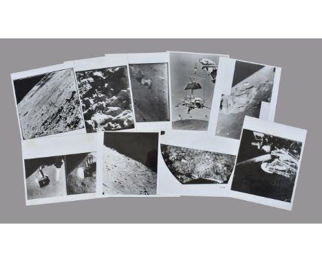 
	
		A group of 28 vintage press photographs including images of the Moon taken by Surveyors 1, 3, 5 and 7, as well as a phot