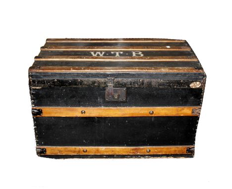 A wood and iron bound canvas covered trunk with lined interior. 76cm x 47cm x 47cm