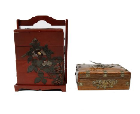 An Oriental style lacquer work four tier lunch box together with a small metal mounted trinket box. 