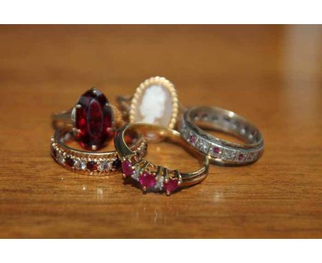 RUBY RING IN SILVER GILT SHANK, 9CT GOLD CAMEO RING
another 9ct gold ring and two eternity rings (5) 