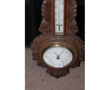 LATE VICTORIAN/EDWARDIAN CARVED OAK CLOCK BAROMETER
carved with naval themes of rope and anchors with foliate decoration, clo