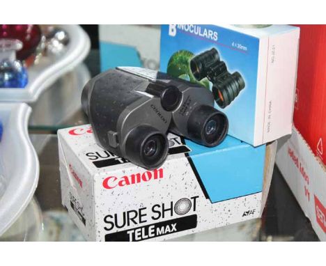 LOT OF VINTAGE CAMERAS AND ACCESSORIES
including a Canon accessory, a Fujica 35, etc