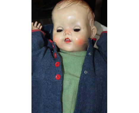 20TH CENTURY VINTAGE DOLL
together with one other doll, together with dolls clothes; together with a Persian rug 