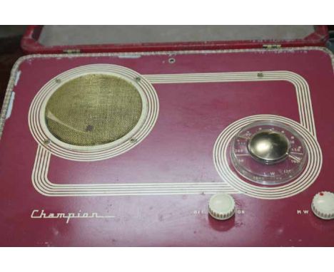 VINTAGE CHAMPION RADIO IN TRAVEL CASE 