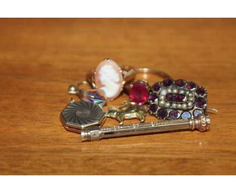 9CT GOLD CAMEO RING AND A VICTORIAN BROOCH
along with a red stone set ring in silver gilt shank, locket, etc 