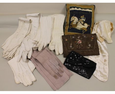 Small collection of various ladies white kid and other gloves, also two small evening purses, a printed lavender cushion and 