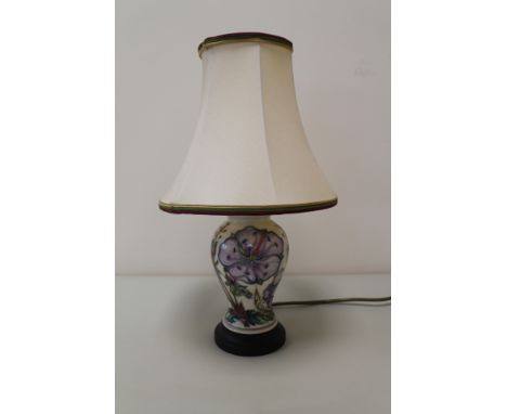 Modern Moorcroft Pottery Meadow Crane's Bill pattern table lamp, with cream shade, 40cm high.