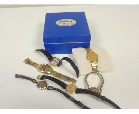 Two lady's 9ct gold watches on straps, three others, an Omega watch box and a Tissot quartz watch, boxed.