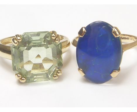 Ring with doublet opal in 9ct gold and another with pale citrine "9K". Sizes "J" and "L". (2)