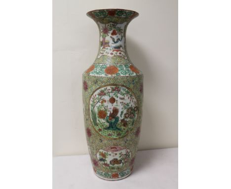 Large Chinese Canton vase of baluster form with panels of flowers, animals, mythical creatures and figures on a floral and fo