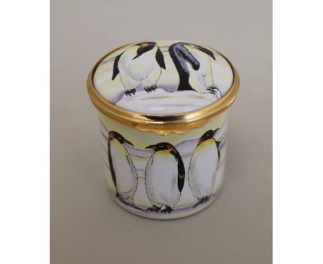 Moorcroft enamel cylindrical trinket box decorated with Emperor Penguins, 5cm high. Condition Report. Good condition, no visi