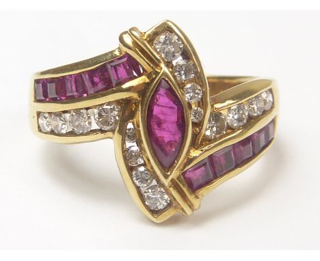 Unusual ring with navette and calibre rubies and graduated diamond brilliants "18K".   Condition Report.  Size "L 1/2".Good c
