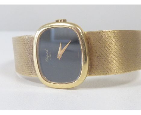 Lady's Chopard 18ct watch, manual with rounded rectangular black dial on milanese bracelet, circa 1970.   Condition Report.  