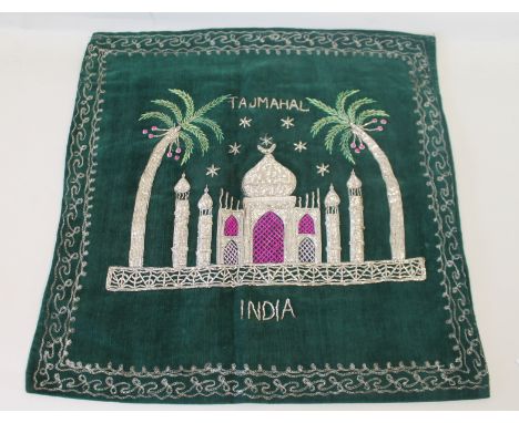 Early 20th century souvenir cushion cover, depicting the Taj Mahal, India, worked in metallic silver and pink and green silk 