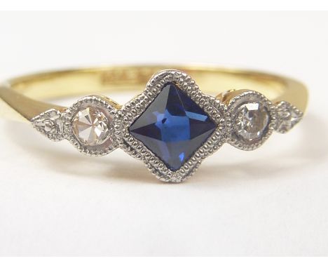 Early 20th century ring with diagonal collet set square sapphire and two diamonds "18ct and Pt". Size "K1/2". Condition Repor