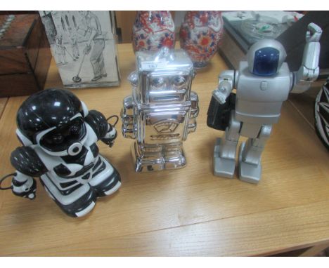 2 Toy robots and robot money box