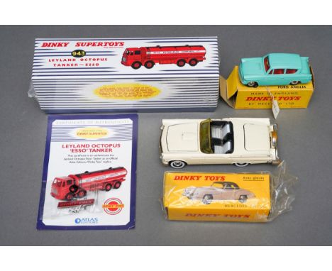 A Dinky Toys 155 Ford Anglia with turquoise body, red interior, silver trim, spun hubs, in good condition, comes with a yello
