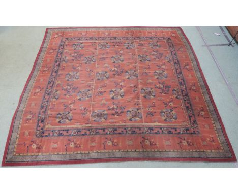A pink ground Chinese style carpet, 265cm x 268cm Provenance: The Late Dr Helen. E. C. Cargill Thompson Condition Report: Ava
