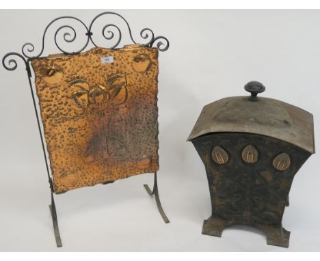 A wrought iron and copper finish Arts and Crafts firescreen, 77cm high x 52cm wide and an Arts and Crafts coal bin (2) Proven