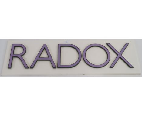 A "RADOX" metal and lilac enamel sign on white board, 34cm high x 112cm wide (letters 23cm high) Condition Report: Available 