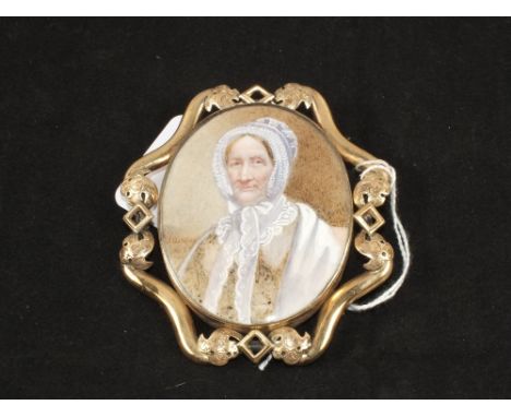 A Victorian miniature portrait of a head and shoulders of a lady in shaped gilt metal frame plus one other 19th Century portr