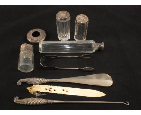 Silver top lidded jars, tongs, shoe horn and button hook plus a bone paper knife