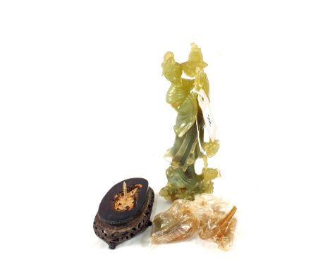 A Chinese Jade figure of a lady holding a basket (damaged)