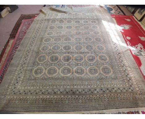 An Afghan brown ground carpet, 142" x 100"