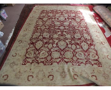 A Pakistan cream and red ground floral carpet, 138" x 105"