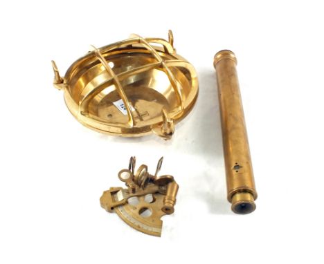 A Brass bulkhead light housing, telescope and clinometer