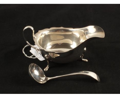 A Silver sauce boat with matching ladle, Sheffield 1937