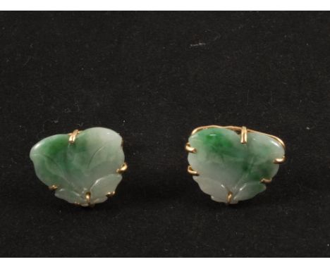 A pair of carved Jade cuff links, 14ct