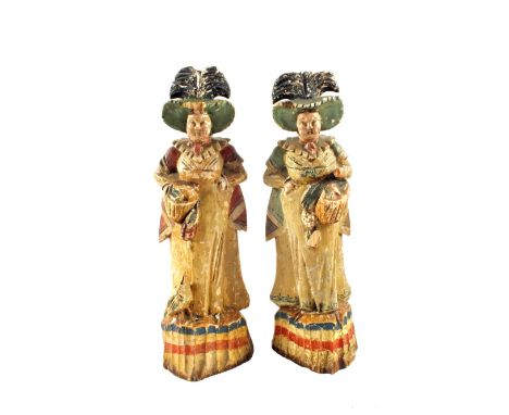 Folk Art, a pair of Napoleonic Prisoner of War polychrome painted lime wood carvings of ladies carrying baskets of food, both