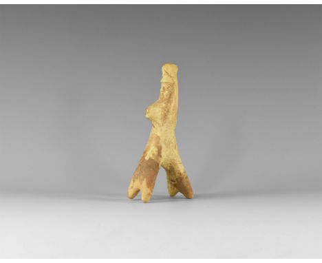 5th-4th century BC. A ceramic figure of a bearded male wearing a Phrygian cap and cloak, seated on the back of a horse with s